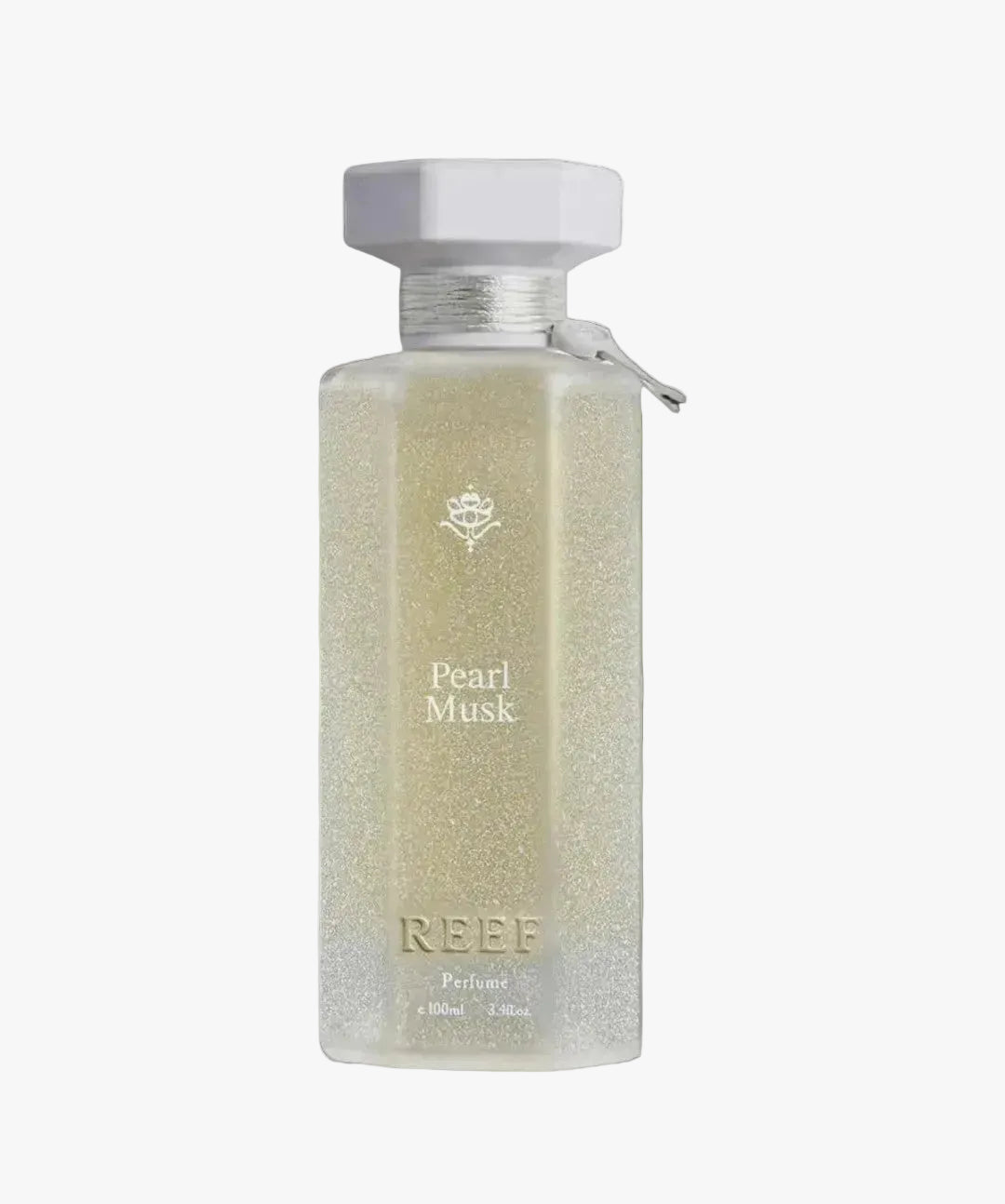 Perfume bottle labeled 'Pearl Musk' by 'REEF' on a light gray background